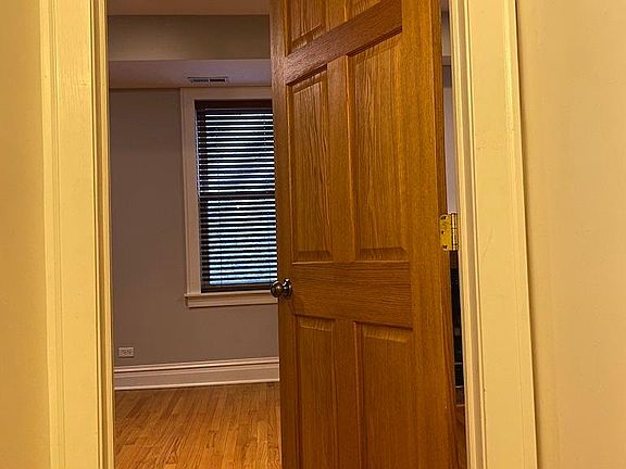 Additional locked entry door into open concept living area