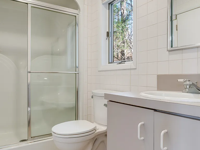 Upstairs bath with tub/shower combination.