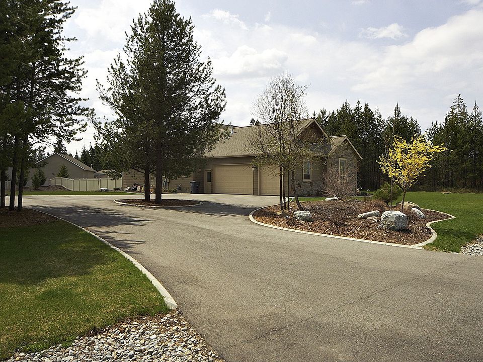 Circular drive, acre is fully landscaped and fenced