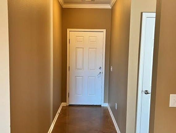 Front entry way with storage closet.