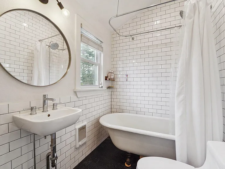 bathroom - cut out of frame is a storage cabinet