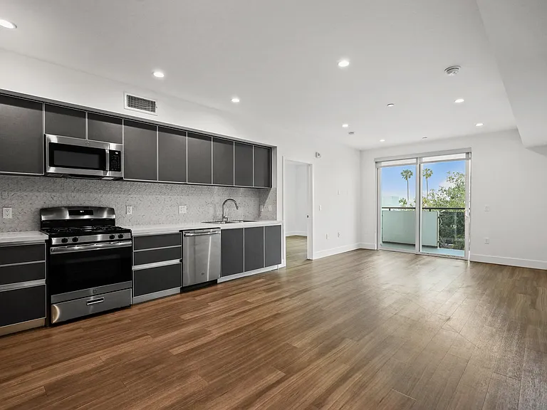 Open-Concept Kitchen, Dining, and Living Room Areas