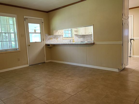 View into kitchen from den