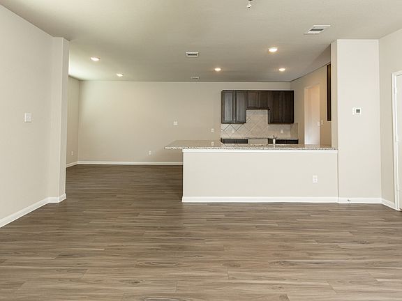 Family Room to Kitchen and Dining Area