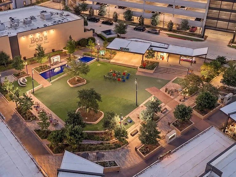 District 121 hosts regular live music, community events, and family movie nights under the stars