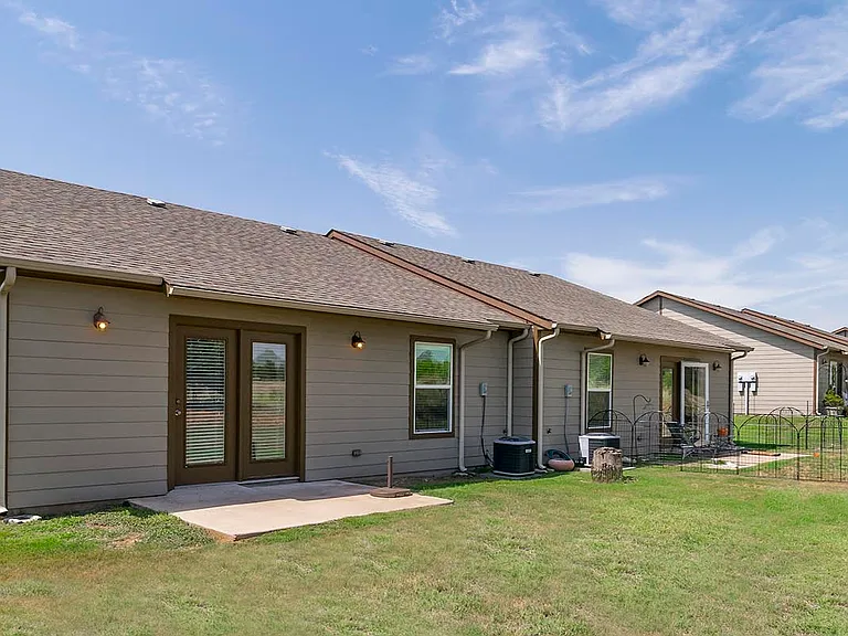 The Phase 2 apartment homes at Gardens of DeCordova include a back porch, just off the living room