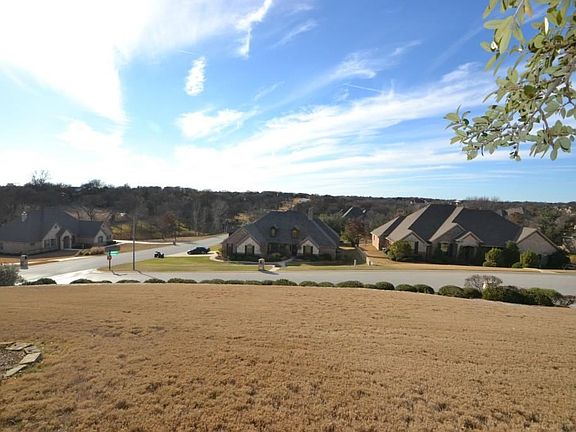 This is the view from the front porch! Enjoy some of the best views in Tarrant County from all four sides of this beautiful home.
