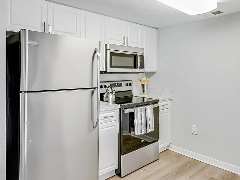 Indulge in our spacious, well-equipped kitchens, your hub for culinary creativity.