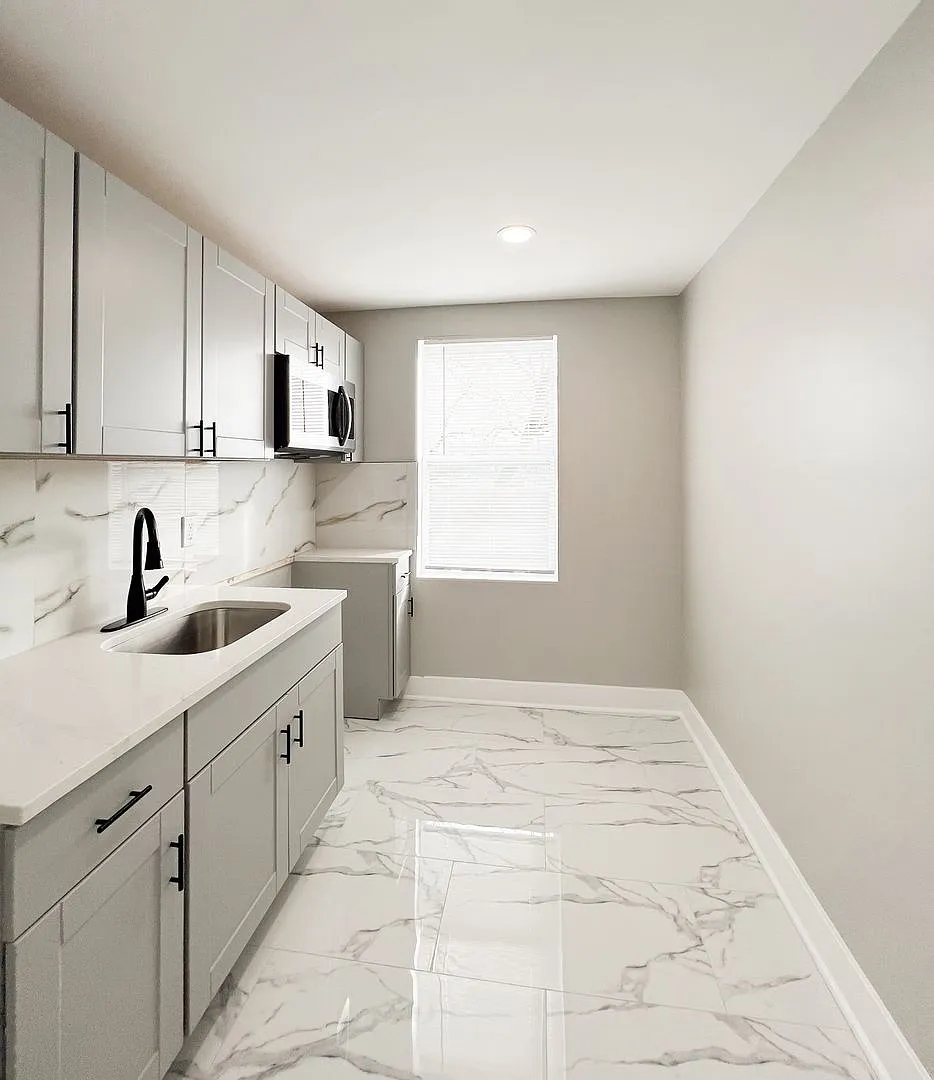 5548 Woodland Ave — Photo 1