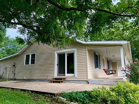 Porch swing and patio.