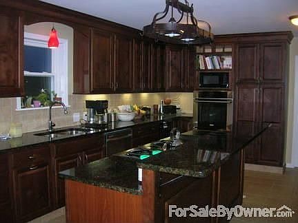 Kitchen
						:
						BAM! Emeril himself would LOVE to cook in this kitchen!