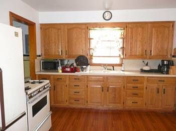 Updated cabinets, gas range & refrigerator included