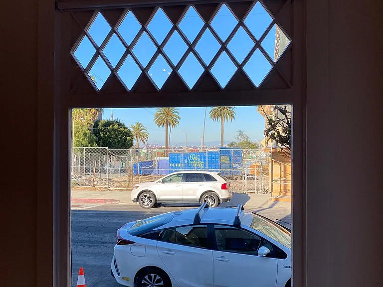 PEEK-A-BOO VIEW OF SAN PEDRO HARBOR JUST PAST UNDER RENOVATION HARBOR VIEW HOUSE ACROSS THE STREET