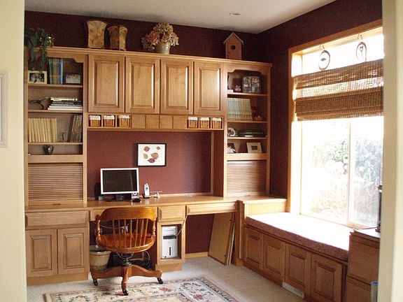 Beautiful custom maple cabinets make this a wonderful, warm home.