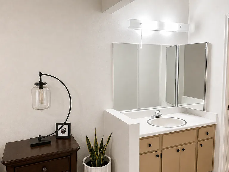 Bathroom (vanity + mirror) in Bedroom 1