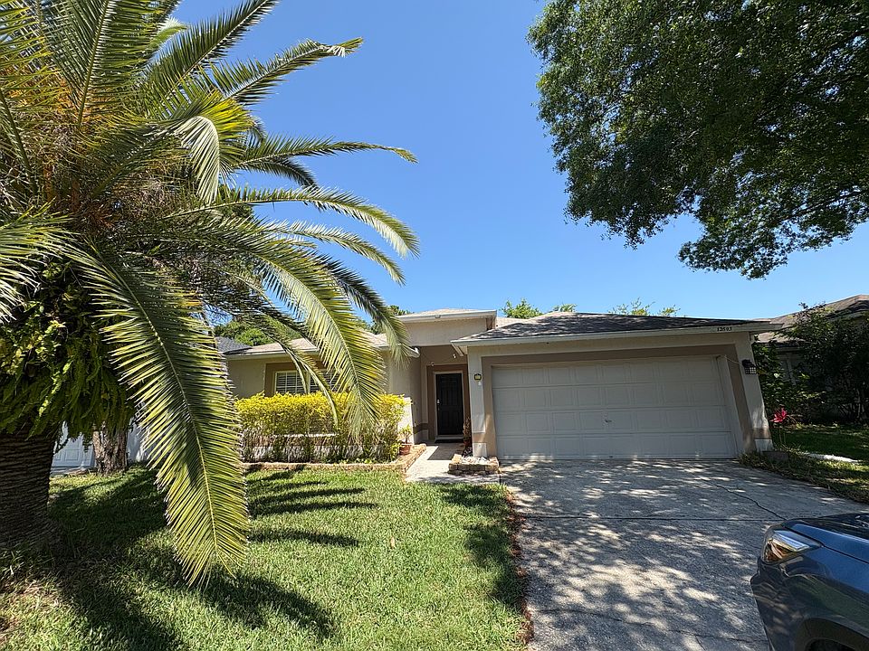 Front door and 2 car garage