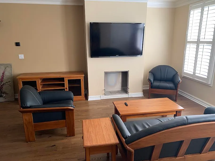Living Room. Flat Screen, Stereo center. Note the luxury blinds.
