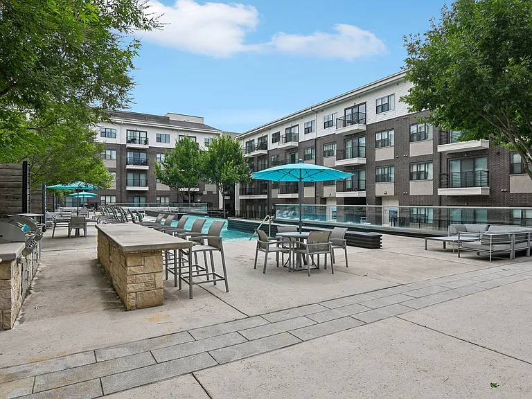Pool Deck with Umbrellas and Grilling Station Markethaus 3700