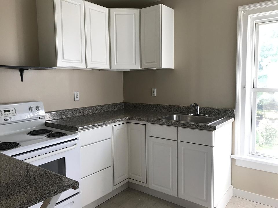 Bright kitchen with stove/range and refrigerator included