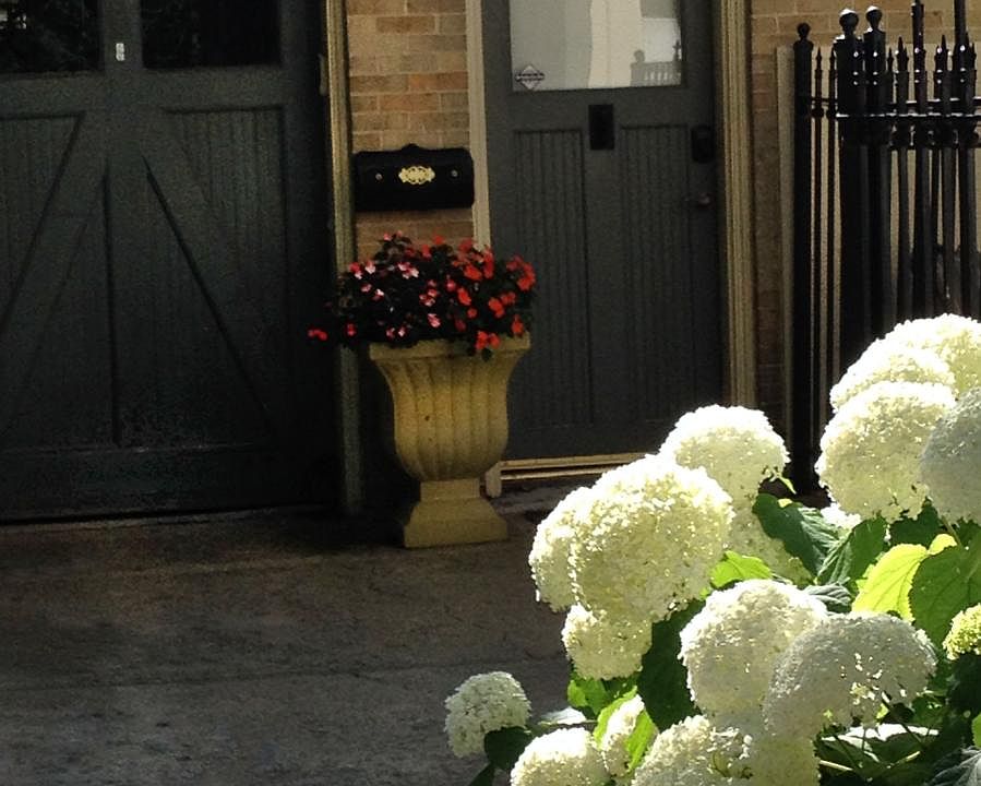 Private entrance to historic Carriage House