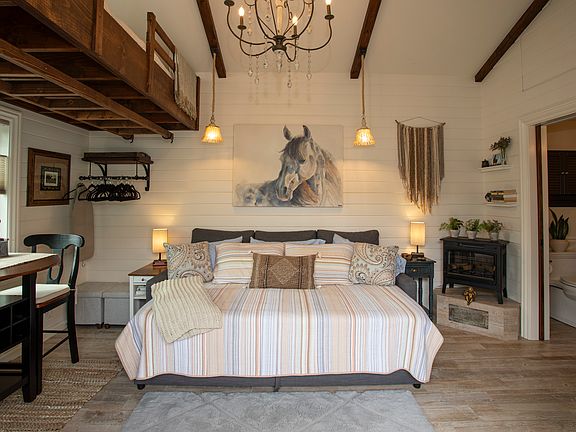 Queen-sized bed with 4" gel memory foam mattress topper.