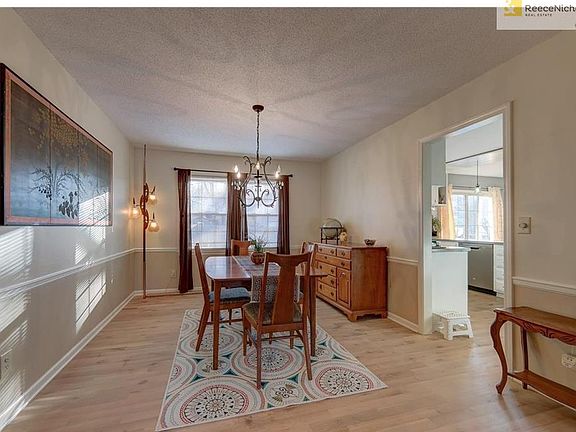 Updated Fixture, hardwood flooring and fresh paint in this stunning Formal Dining room.  Excellent location for an office also.