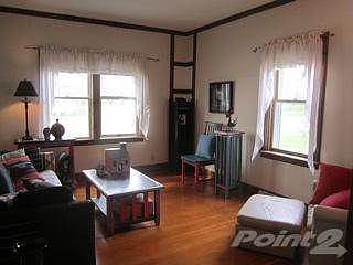 Living room with Hardwood floors and great windows from the South and West for good light