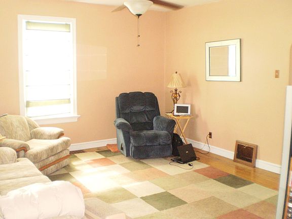 Spacious living room with good flow and wonderful light.