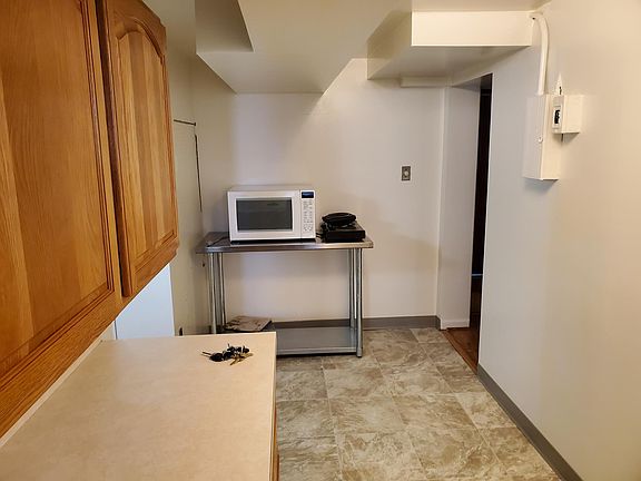 Cooking facilities include microwave convection oven and hotplate