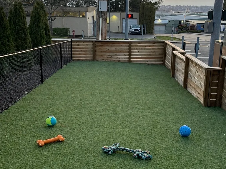 Private, enclosed dog play and relief area for small dogs up to 30 lbs.