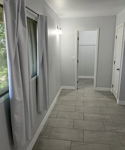 Second Floor Master Bedroom, Brand New Tile and Grout Flooring, New Baseboard Molding, New Curtains, Wall Sconce Lighting, Ceiling Fan with Light, Walk in Closet, 3/4 Master Bathroom with Shower.