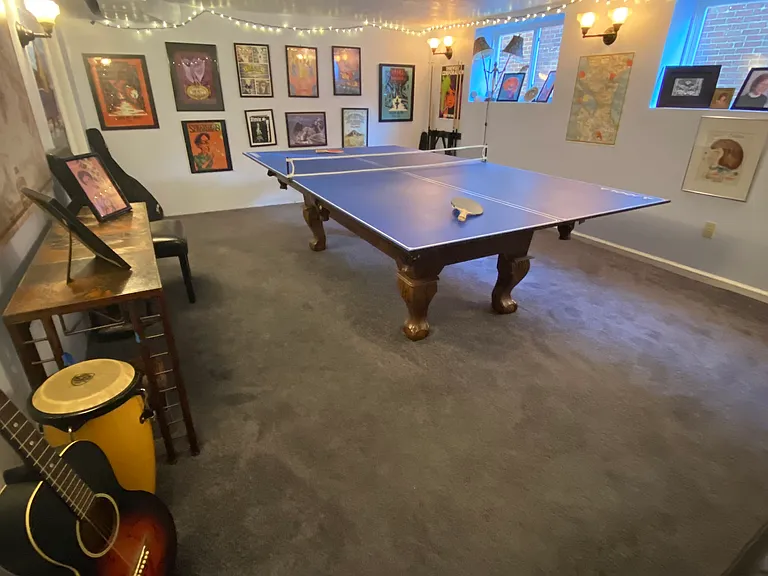 Basement game room with ping pong table