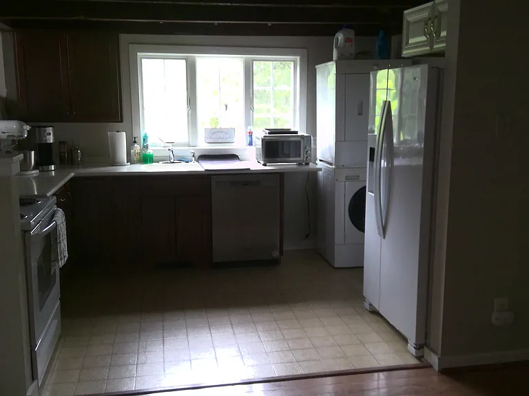 Kitchen, open beams, custom cabinetry, Corian countertops