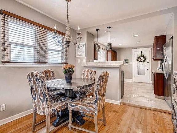 dining area looking toward back of house and door to laundry room