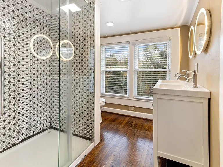 Upstairs Bathroom Neutral and updated upstairs bathroom with thoughtful finishes comfort and style in a multi-level rental.