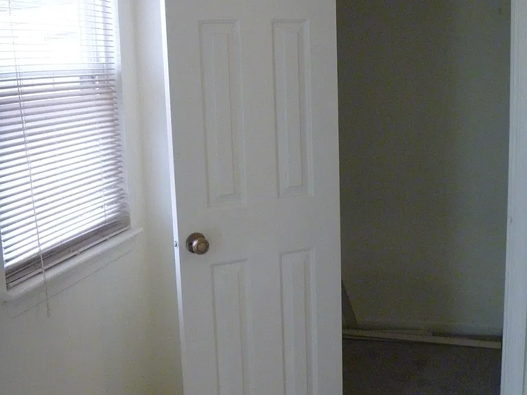 Large closet in downstairs bedroom.