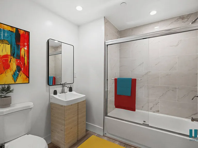 Bathroom with Shower Bath and Vanity Cabinet Storage