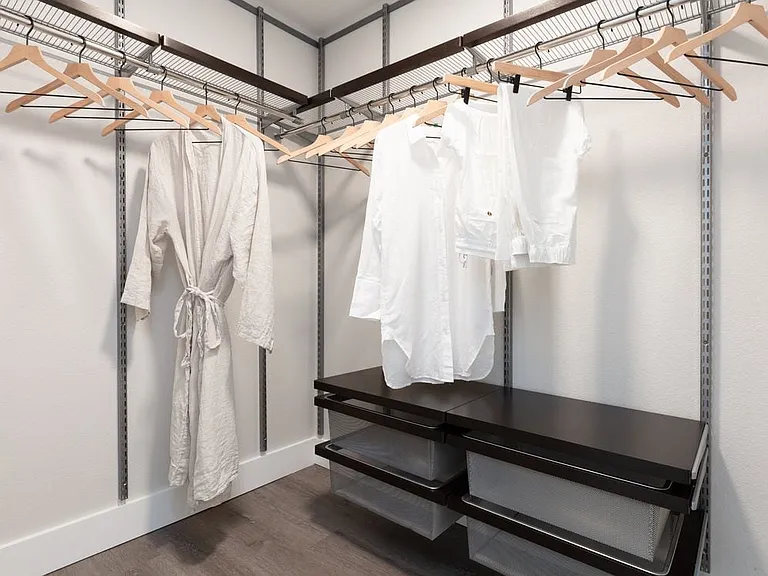 Signature Collection Walk-in closet with customizable ELFA organization system