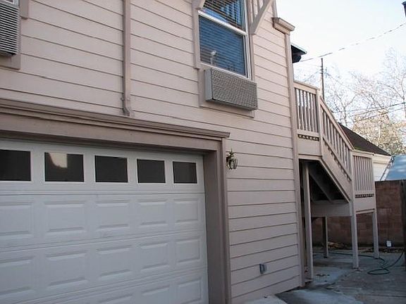 Apartment above garage with stairway.