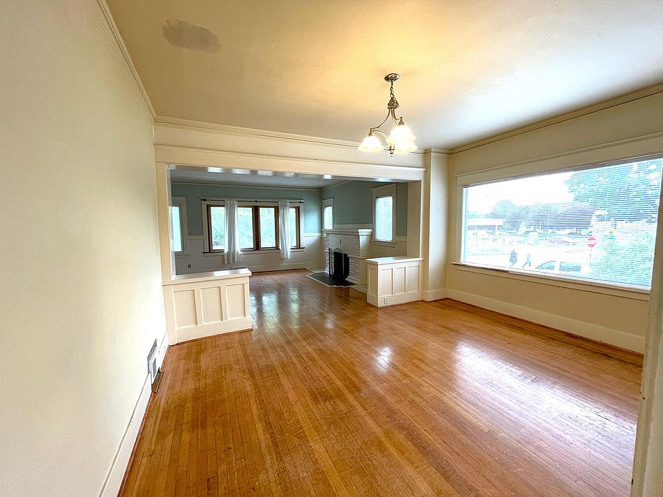 Dining Room with Living Room in background