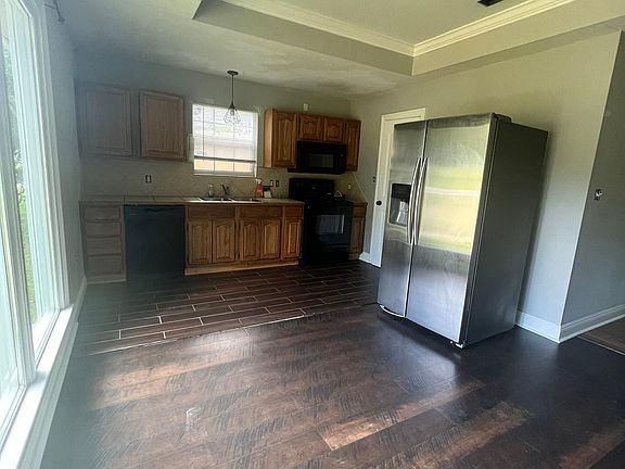 Front Door Entrance into the living room and open kitchen