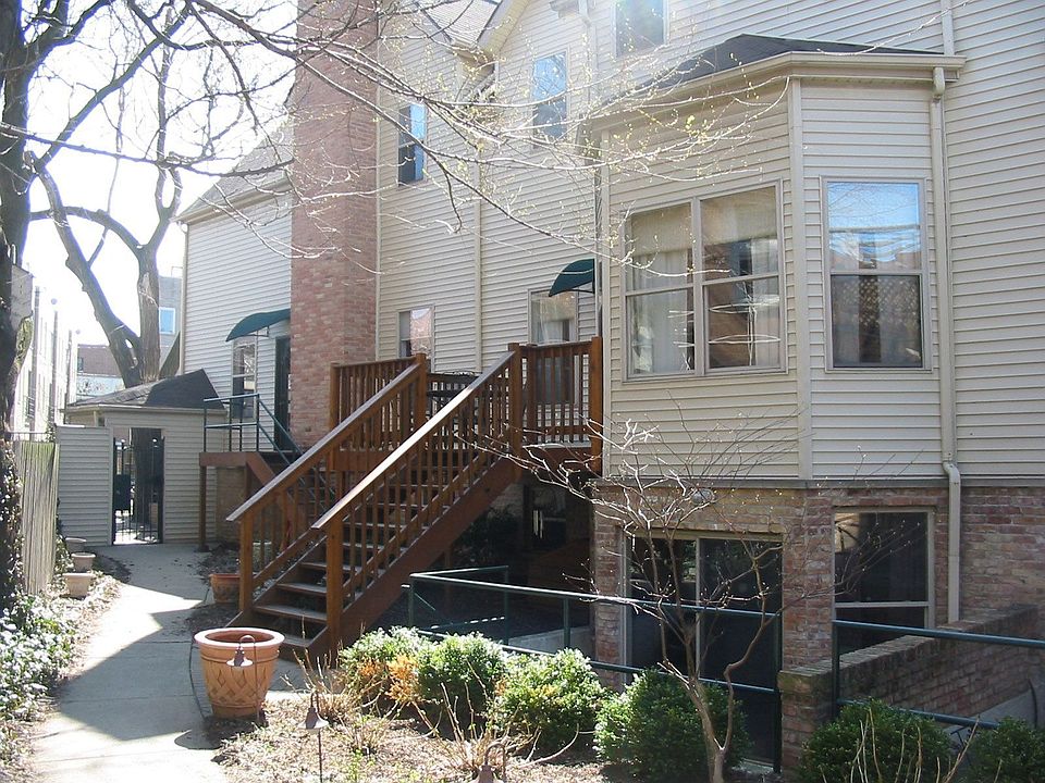 Exterior with Professionally Landscaped Courtyard