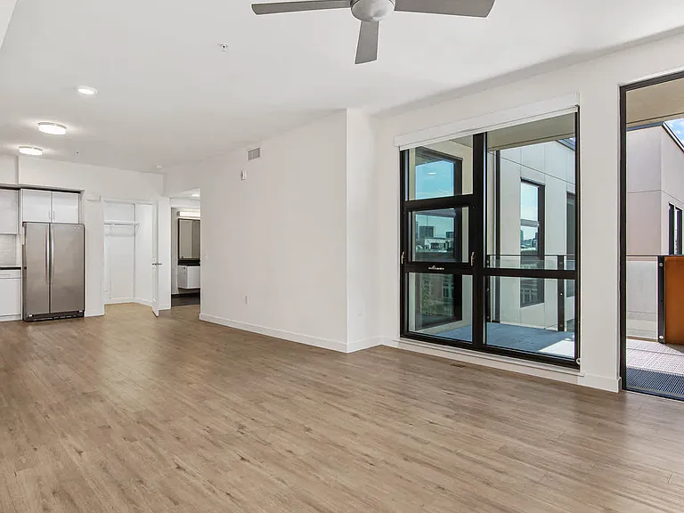 Living Room with Balcony and Hard Surface Flooring
