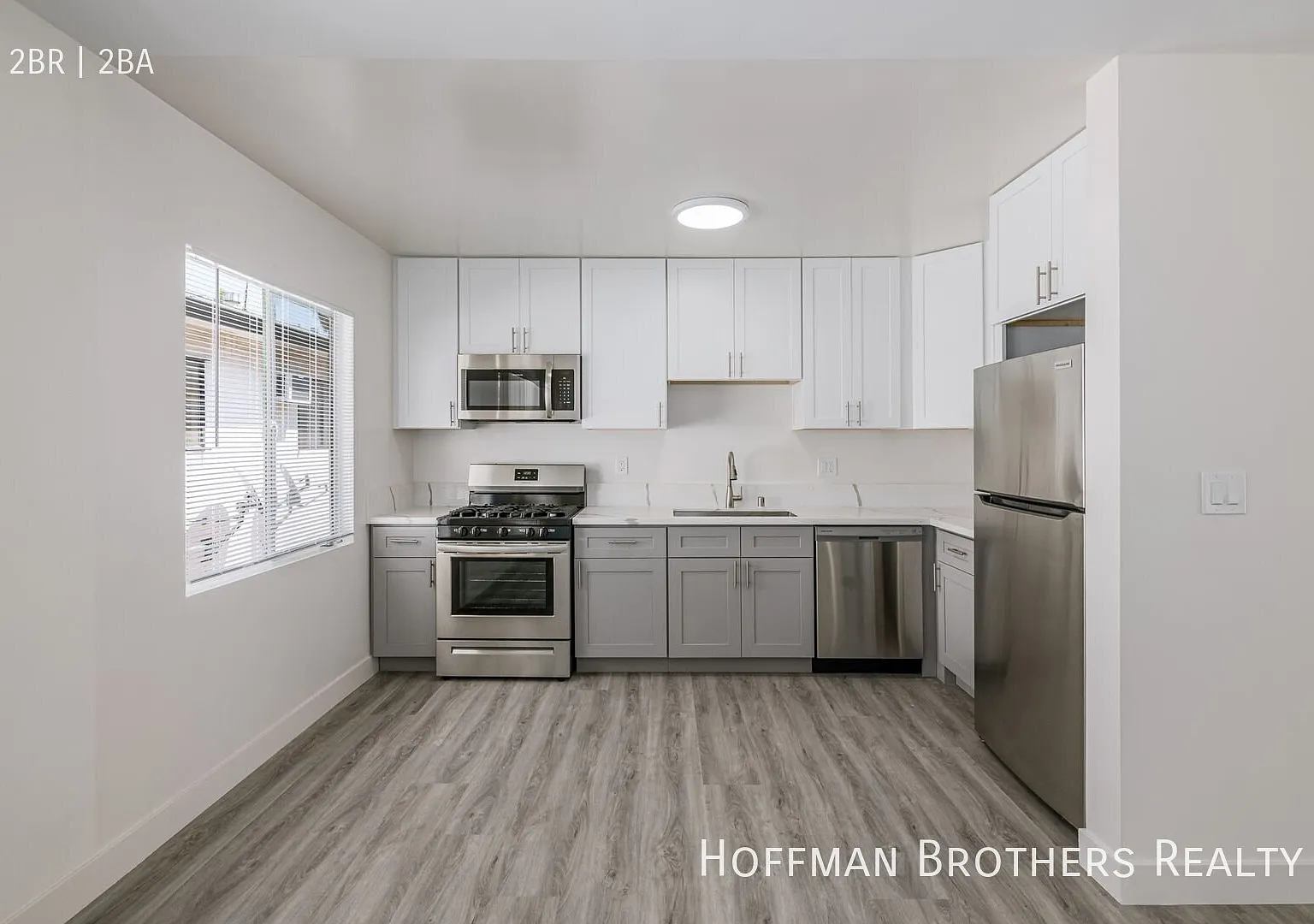 Spacious & Refined Residence with a Bright, Effortless Flow! — Photo 2