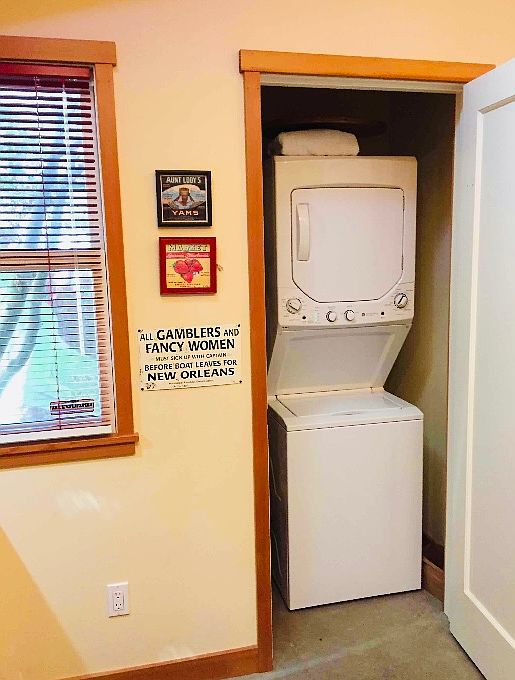 Laundry closet (supply shelves left wall of closet)