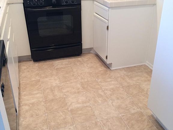 Kitchen with stove, microwave and dishwasher.
