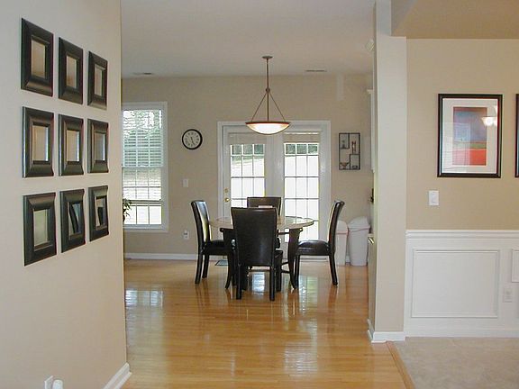 Main level has extensive hardwoods, open & flowing plan