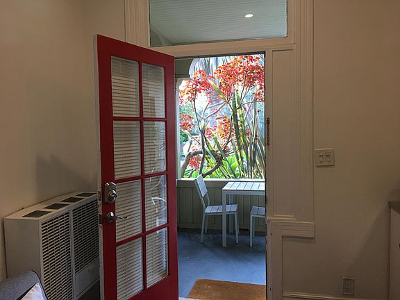 Opens to private porch sitting area.