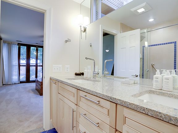 The recently-upgraded ensuite primary bathroom.