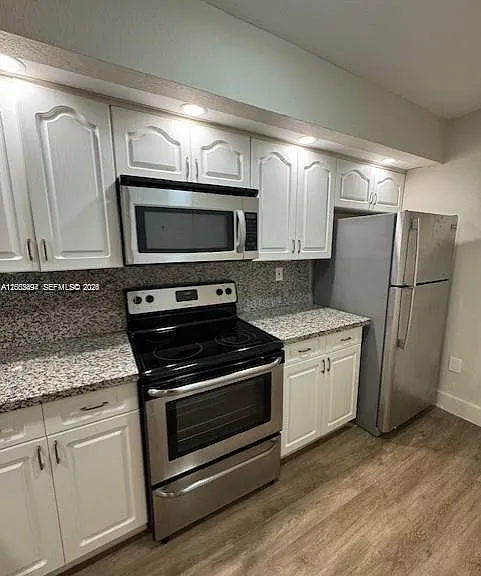 8620 SW 212th St #103 — Photo 3